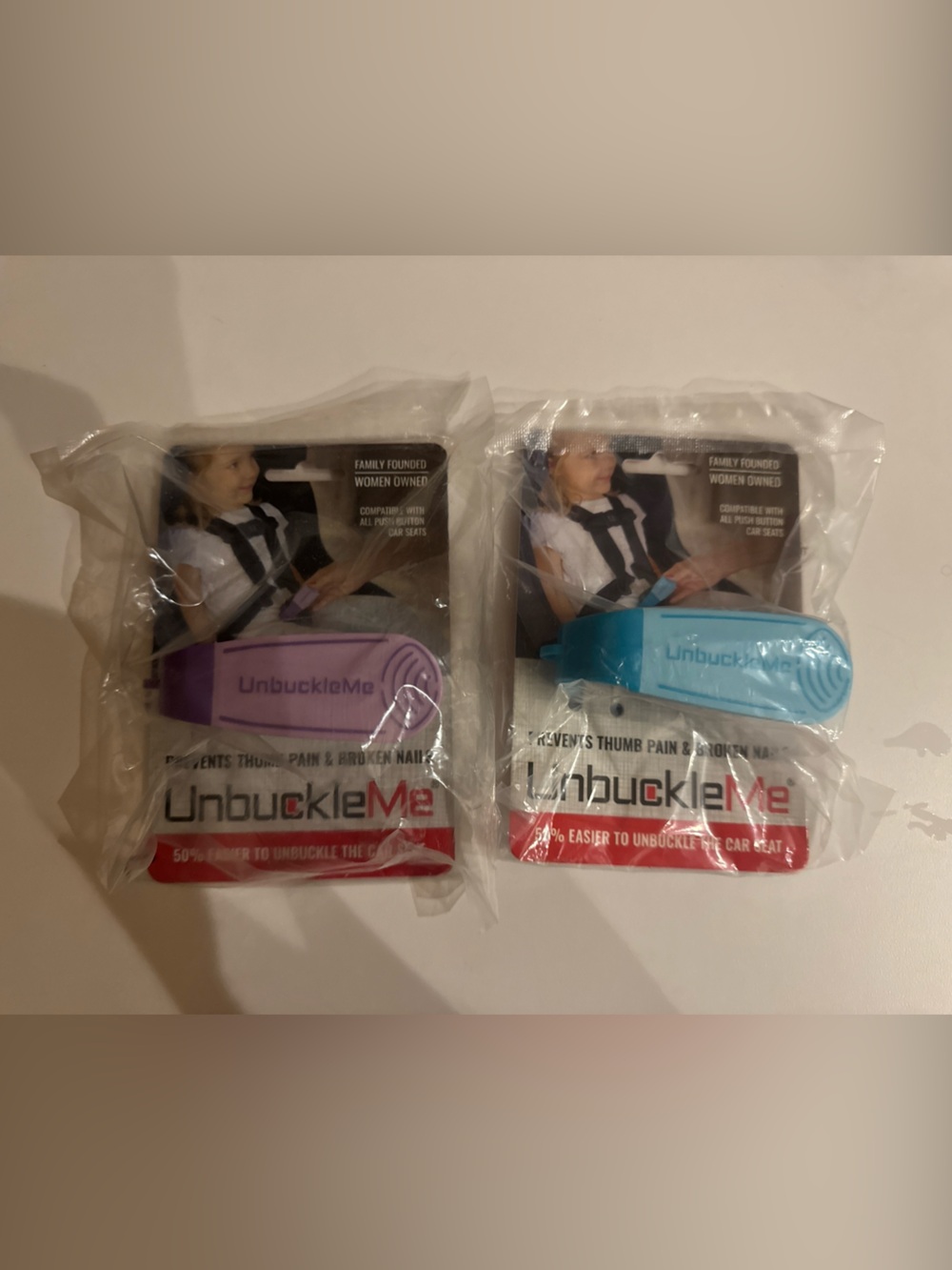 UnbuckleMe Car Seat Buckle Release Tool 2 Pack Purple Blue New Sealed